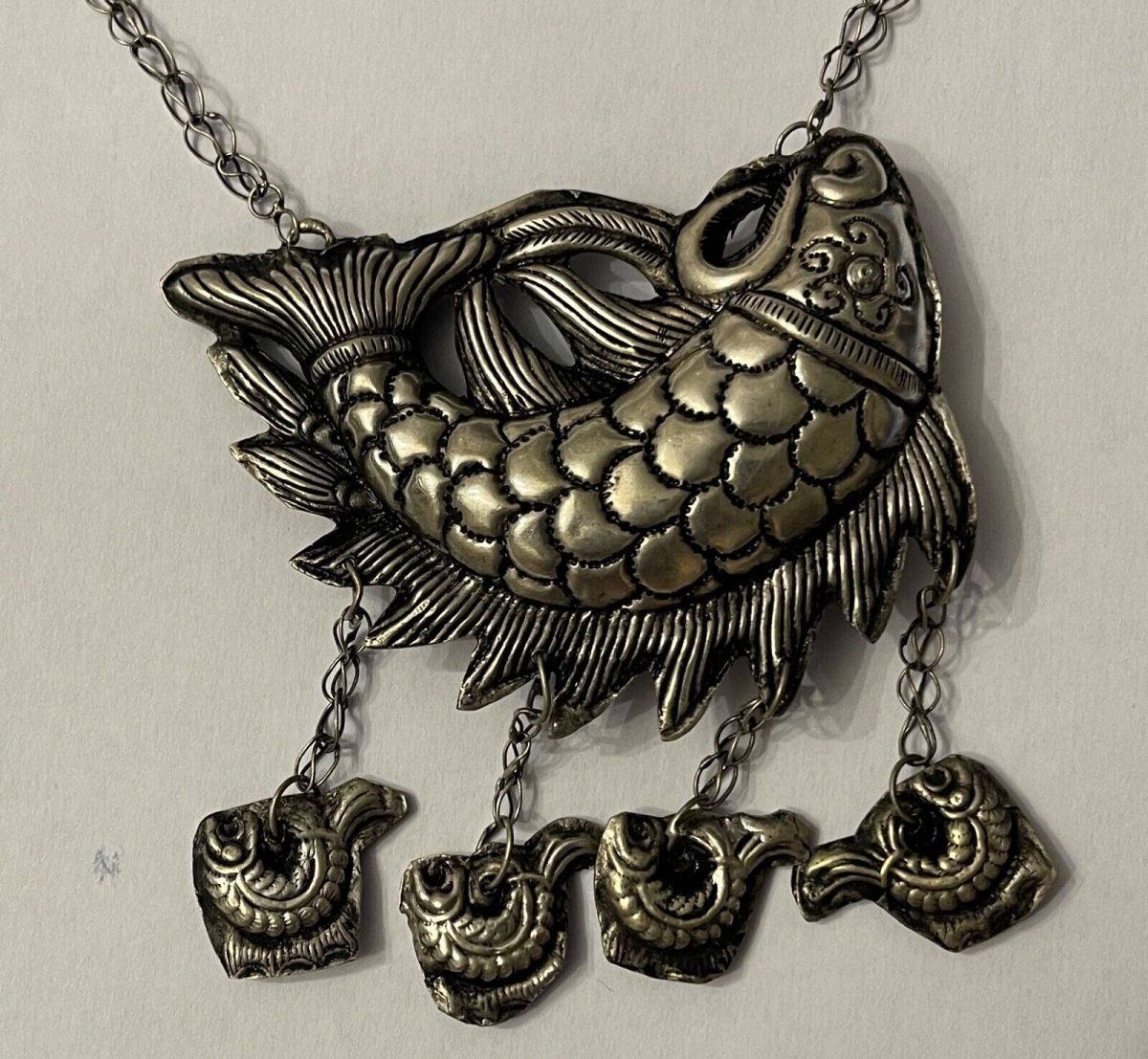 pendentif_grelot_chine_poisson_miao_xxe_symbole_feminin_de_fertilite
