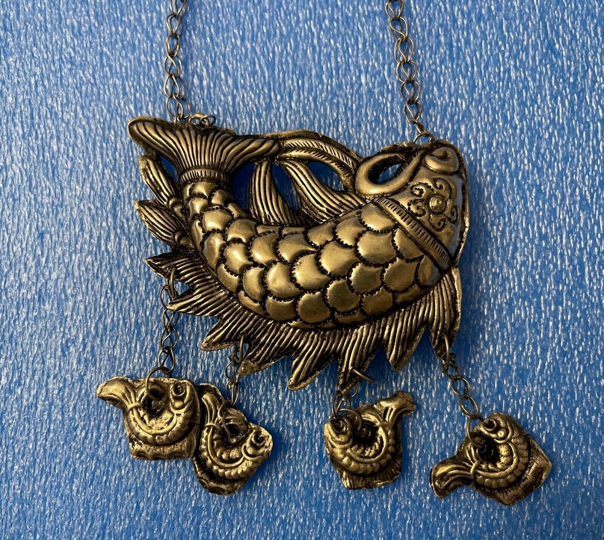 pendentif_grelot_chine_poisson_miao_xxe_symbole_feminin_de_fertilite