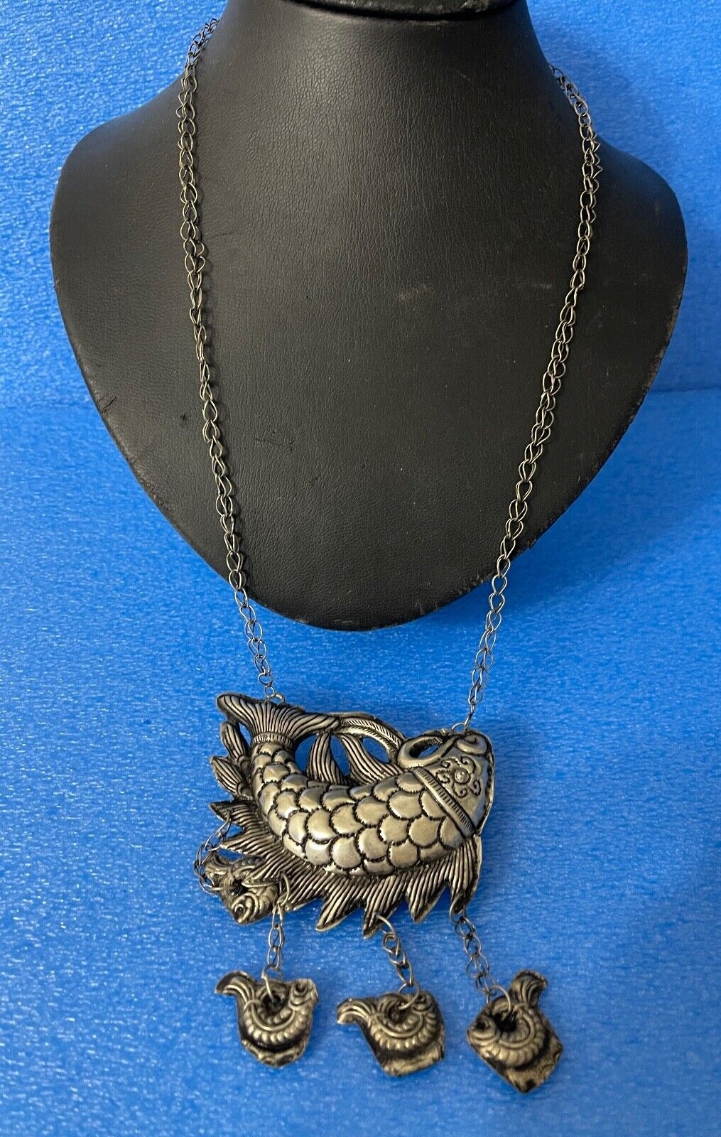 pendentif_grelot_chine_poisson_miao_xxe_symbole_feminin_de_fertilite