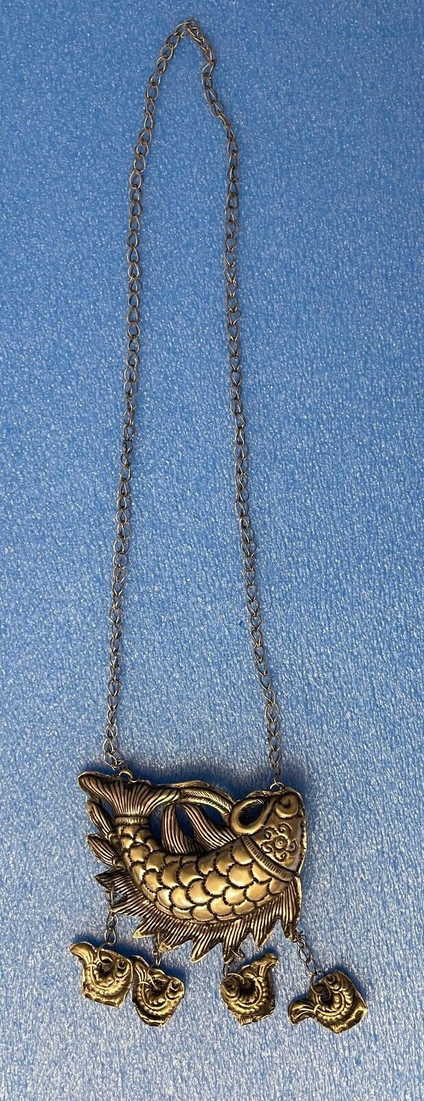 pendentif_grelot_chine_poisson_miao_xxe_symbole_feminin_de_fertilite